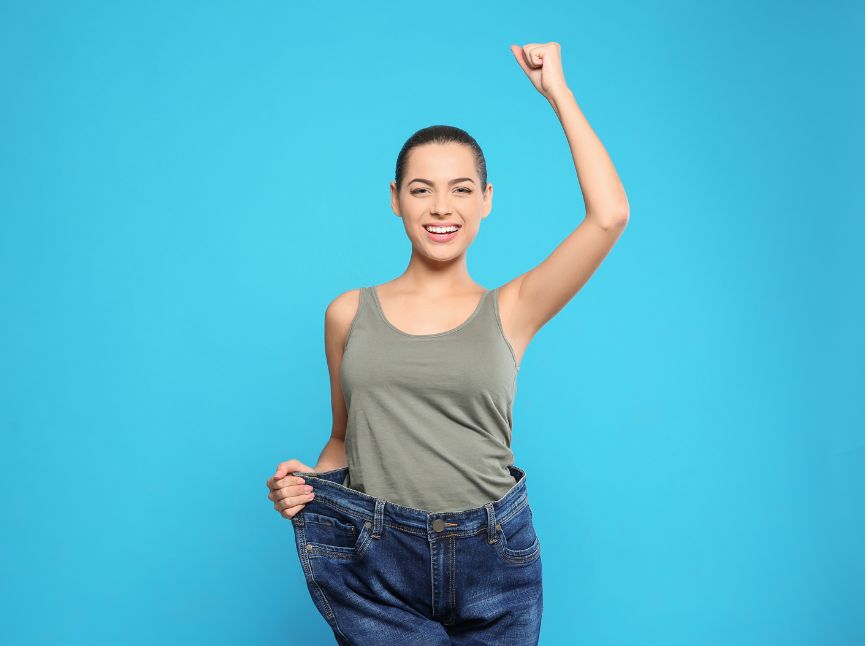 A woman with her hand up in the air